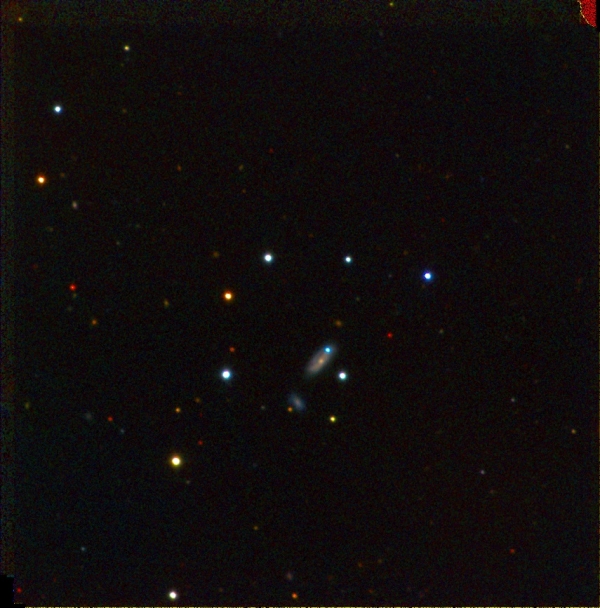 Сверхновая PTF 11kx - синяя точка в центральной галактике (lbl.gov)