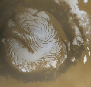 Шапка на северном полюсе Марса (sciencedaily.com) Шапка на северном полюсе Марса (sciencedaily.com)
