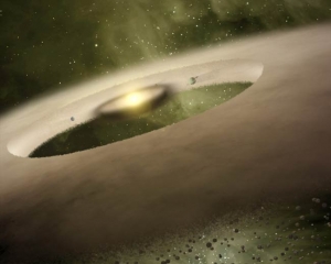 Рисунок протопланетного диска звезды, имеющего разрыв (space.com)