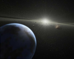 Рисунок планеты около белого карлика, окруженного астероидной пылью (space.com)