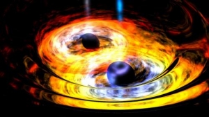 Рисунок сближения черных дыр (phys.org)
