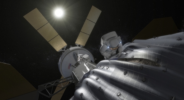 Астронавт изучает прирученный астероид (nasa.gov) Астронавт изучает прирученный астероид (nasa.gov)