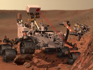 Curiosity использует лазерный луч для анализа химического состава камня спектрометром (nasa.gov) Curiosity использует лазерный луч для анализа химического состава камня спектрометром (nasa.gov)