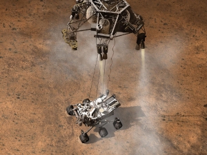 Спуск марсохода Curiosity на кране (space.com)
